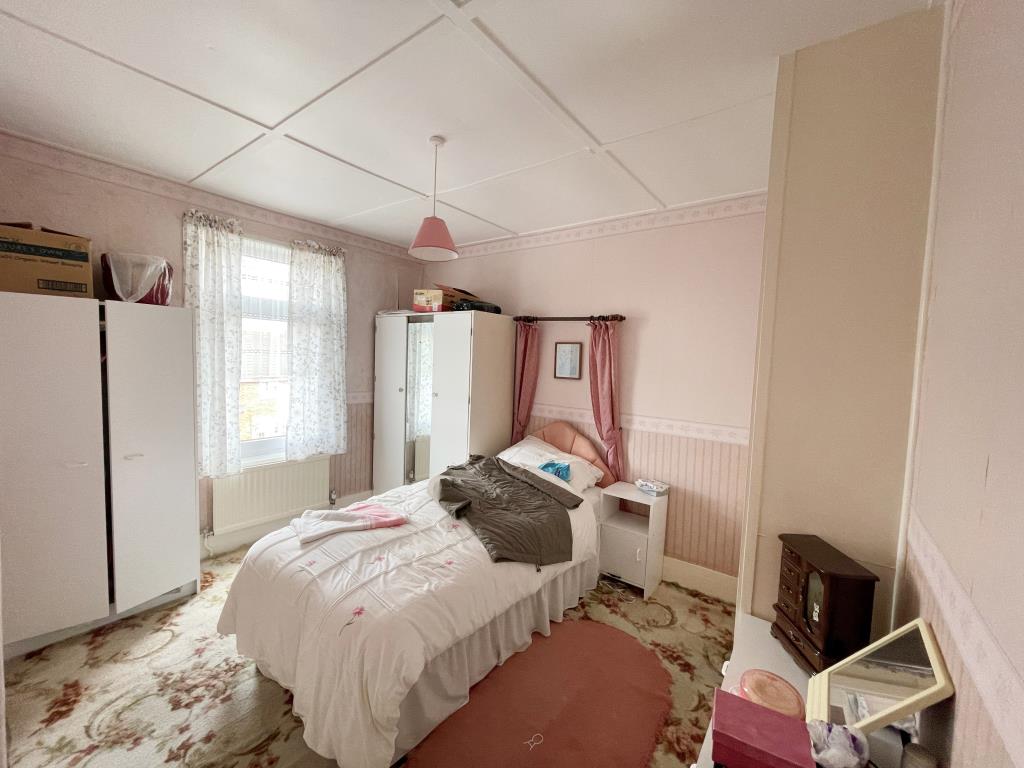 Lot: 63 - TWO-BEDROOM HOUSE FOR REFURBISHMENT - Bedroom with window